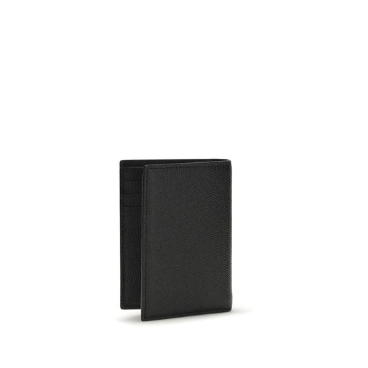 Valentino Garavani Black Calf Leather Bos Taurus Wallet Curated Luxury Accessories by Orvyn