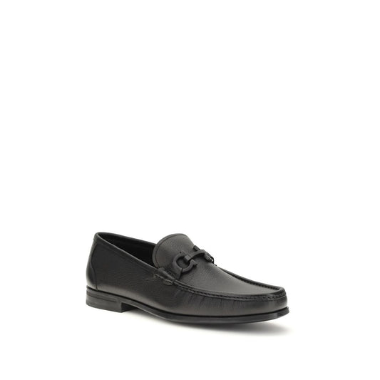 Ferragamo Black Calf Leather Bos Taurus Slip-On Loafers Curated Luxury Accessories by Orvyn