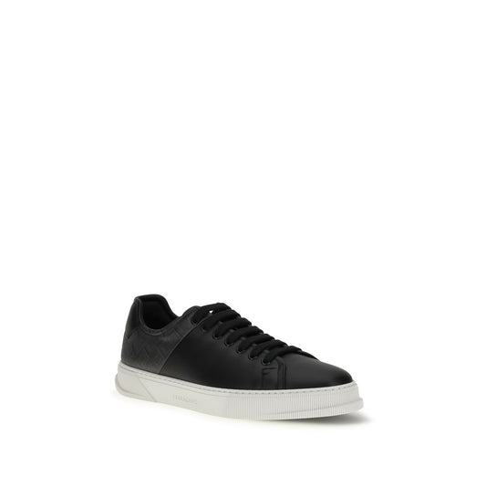 Ferragamo Black Calf Leather Bos Taurus Low Top Sneakers Curated Luxury Accessories by Orvyn