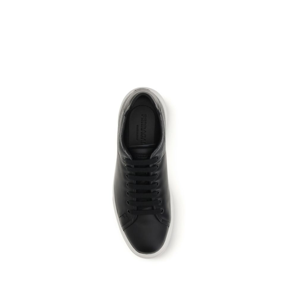 Ferragamo Black Calf Leather Bos Taurus Low Top Sneakers Curated Luxury Accessories by Orvyn