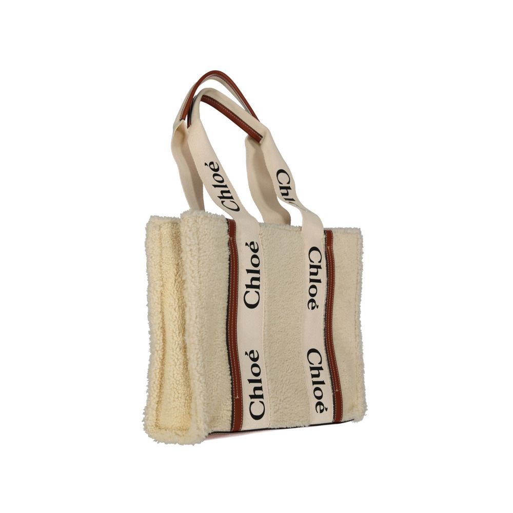 Chloé Beige Lamb Fur Tote Bag Curated Luxury Accessories by Orvyn