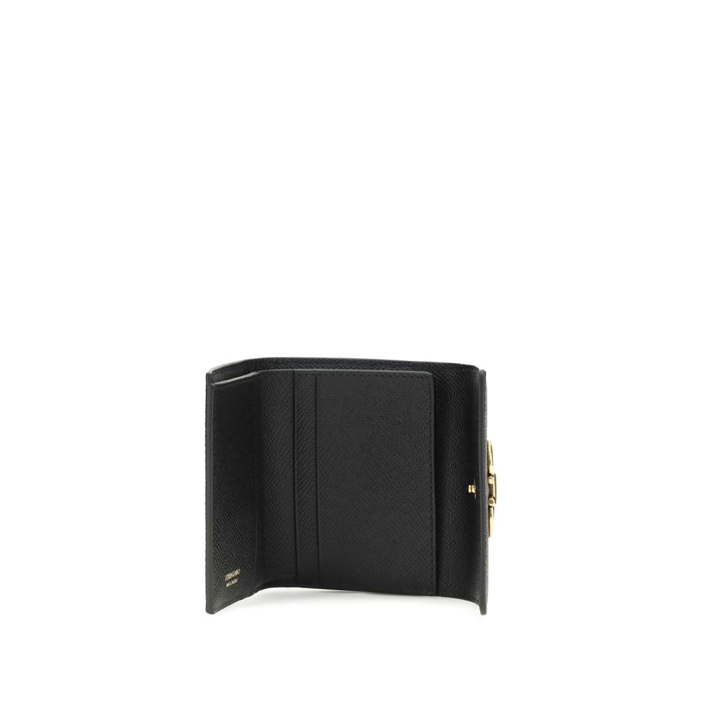 Ferragamo Black Calf Leather Bos Taurus Wallet Curated Luxury Accessories by Orvyn