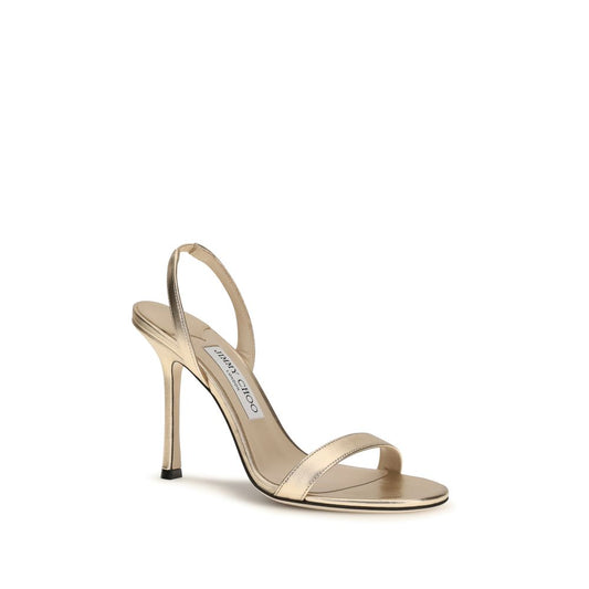 Jimmy Choo Gold Calf Leather Bos Taurus Stiletto Heel Sandals Curated Luxury Accessories by Orvyn