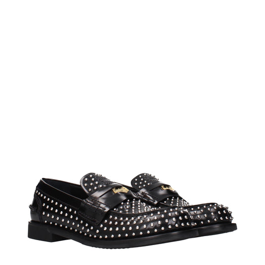 Miu Miu Black Leather Slip-On Loafers Curated Luxury Accessories by Orvyn