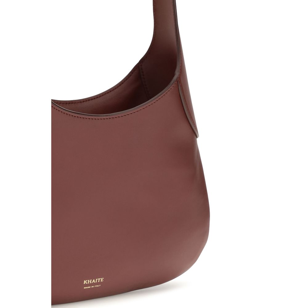 Khaite Bordeaux Calf Leather Bos Taurus Shoulder Bag Curated Luxury Accessories by Orvyn