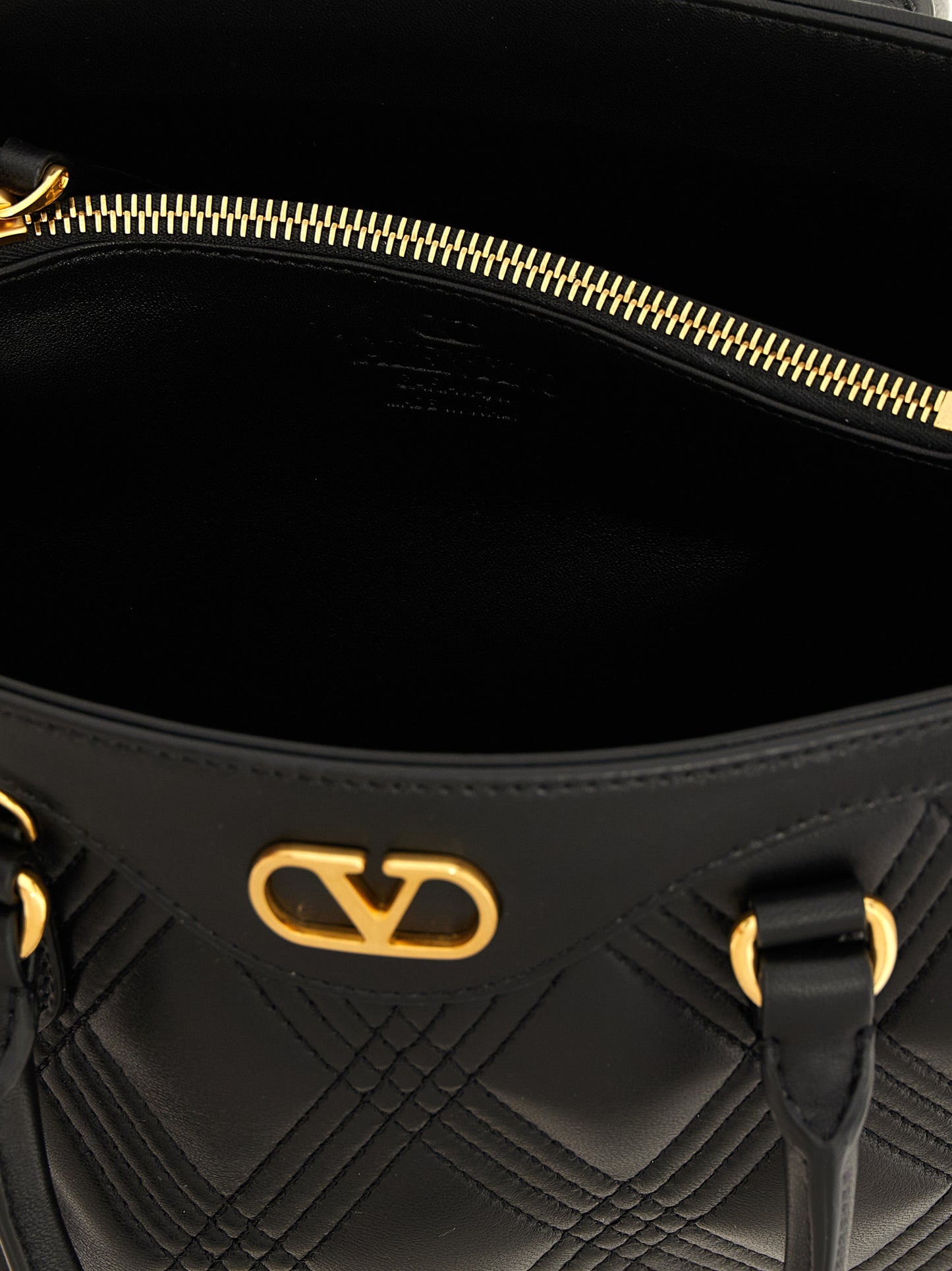 Valentino Garavani Black Lamb Leather Handbag Curated Luxury Accessories by Orvyn
