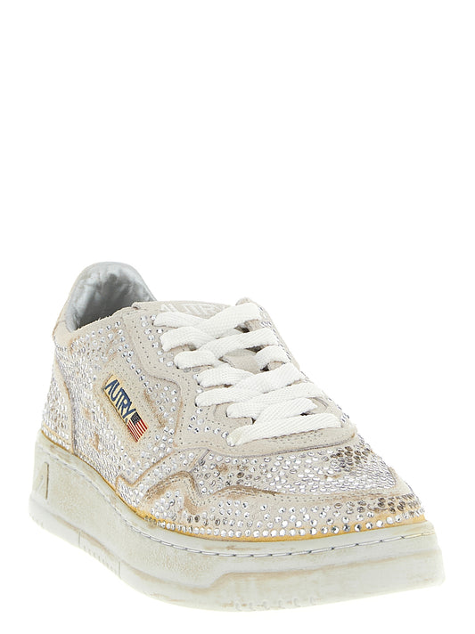 Autry Beige Cowhide Chunky Sneakers Curated Luxury Accessories by Orvyn