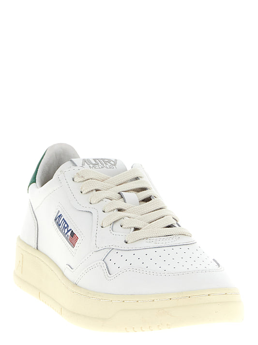 Autry Bicolor Goatskin Low Top Sneakers Curated Luxury Accessories by Orvyn
