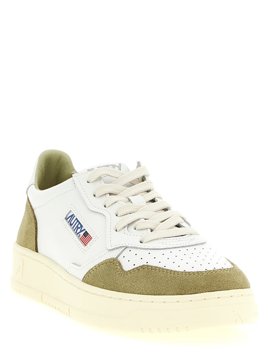 Autry Bicolor Cowhide Low Top Sneakers Curated Luxury Accessories by Orvyn