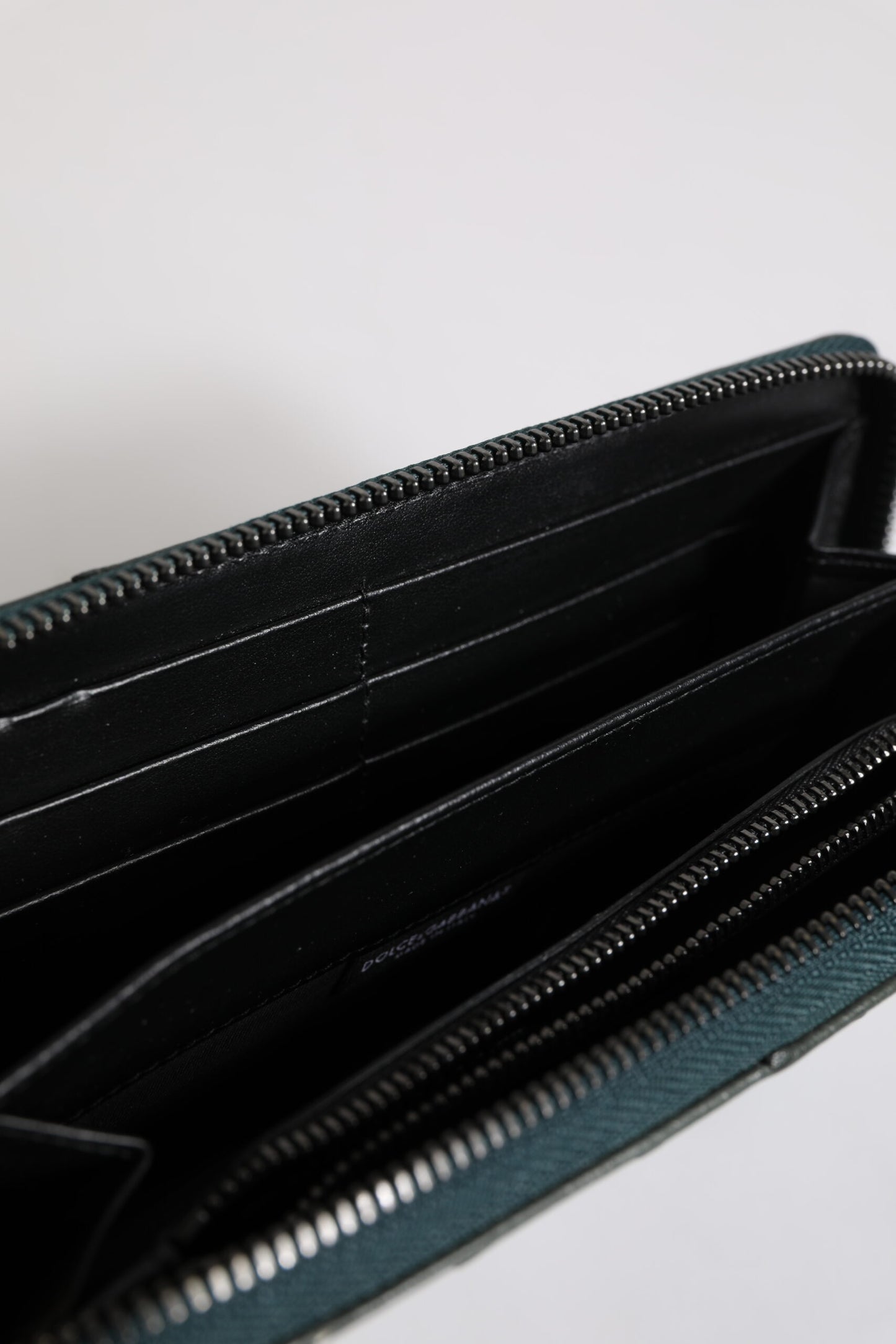 Dolce & Gabbana Green Ostrich Logo Plaque Zip Around Continental Wallet Curated Luxury Accessories by Orvyn