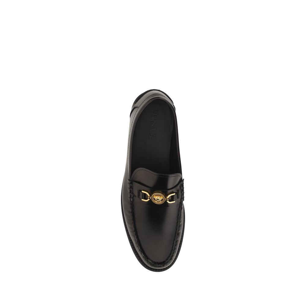 Versace Black Calf Leather Bos Taurus Slip-On Loafers Curated Luxury Accessories by Orvyn
