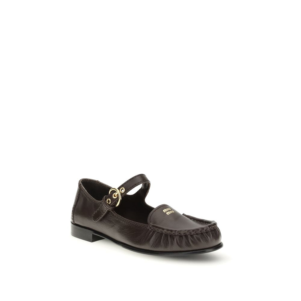 Miu Miu Brown Calf Leather Bos Taurus Slip-On Loafers Curated Luxury Accessories by Orvyn