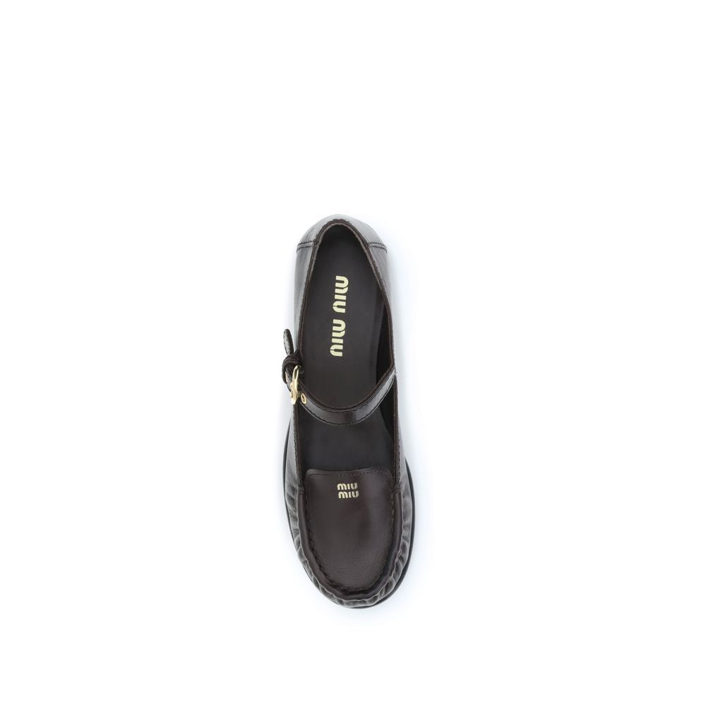 Miu Miu Brown Calf Leather Bos Taurus Slip-On Loafers Curated Luxury Accessories by Orvyn