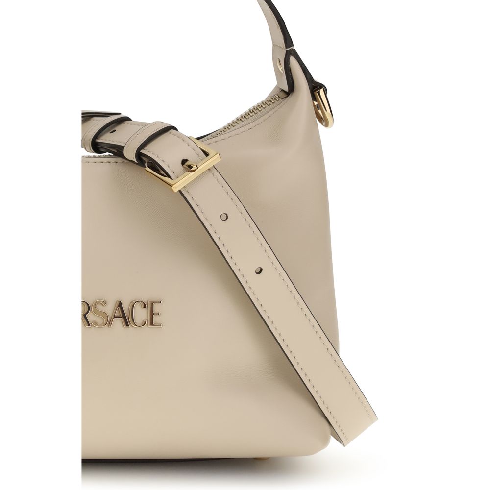 Versace Beige Calf Leather Bos Taurus Handbag Curated Luxury Accessories by Orvyn
