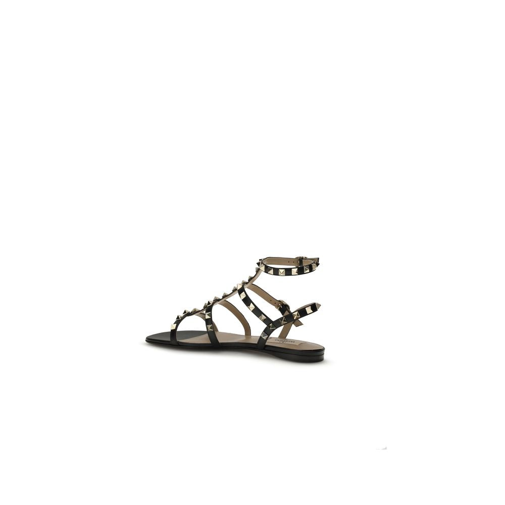 Valentino Garavani Black Calf Leather Bos Taurus Flat Sandals Curated Luxury Accessories by Orvyn