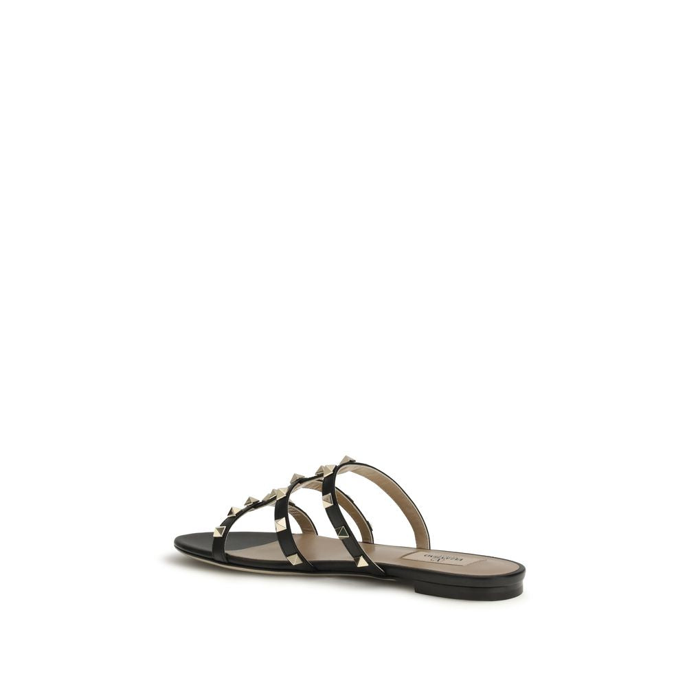 Valentino Garavani Black Calf Leather Bos Taurus Flat Sandals Curated Luxury Accessories by Orvyn