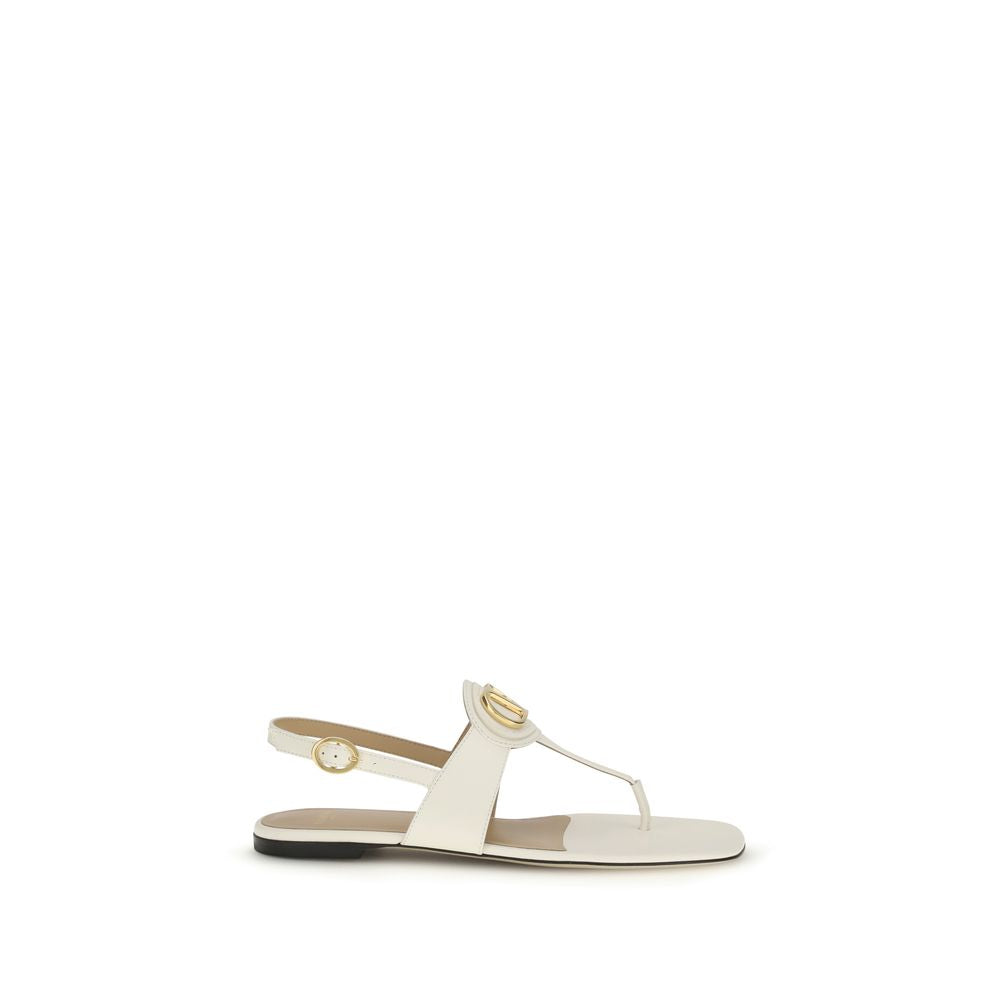 Valentino Garavani Beige Calf Leather Bos Taurus Flat Sandals Curated Luxury Accessories by Orvyn