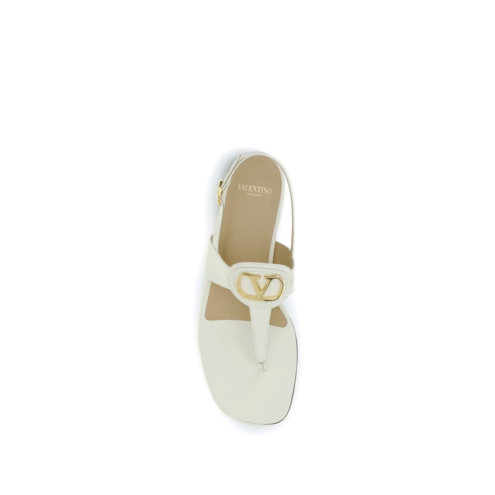 Valentino Garavani Beige Calf Leather Bos Taurus Flat Sandals Curated Luxury Accessories by Orvyn