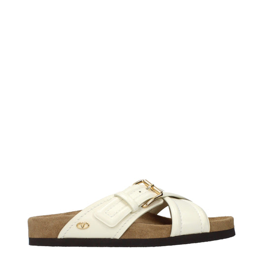 Valentino Garavani Beige Leather Slippers Curated Luxury Accessories by Orvyn