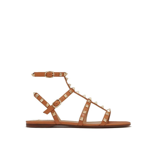 Valentino Garavani Brown Leather Flat Sandals Curated Luxury Accessories by Orvyn