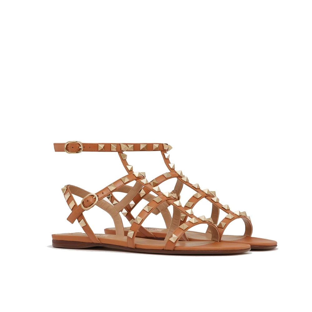 Valentino Garavani Brown Leather Flat Sandals Curated Luxury Accessories by Orvyn