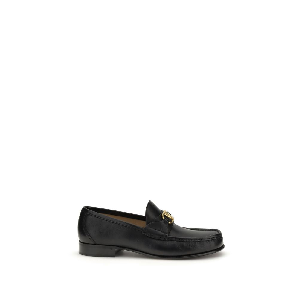 Valentino Garavani Black Calf Leather Bos Taurus Slip-On Loafers Curated Luxury Accessories by Orvyn