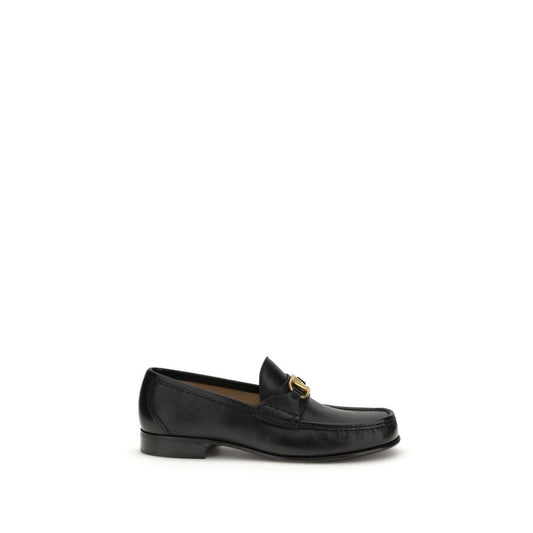 Valentino Garavani Black Calf Leather Bos Taurus Slip-On Loafers Curated Luxury Accessories by Orvyn