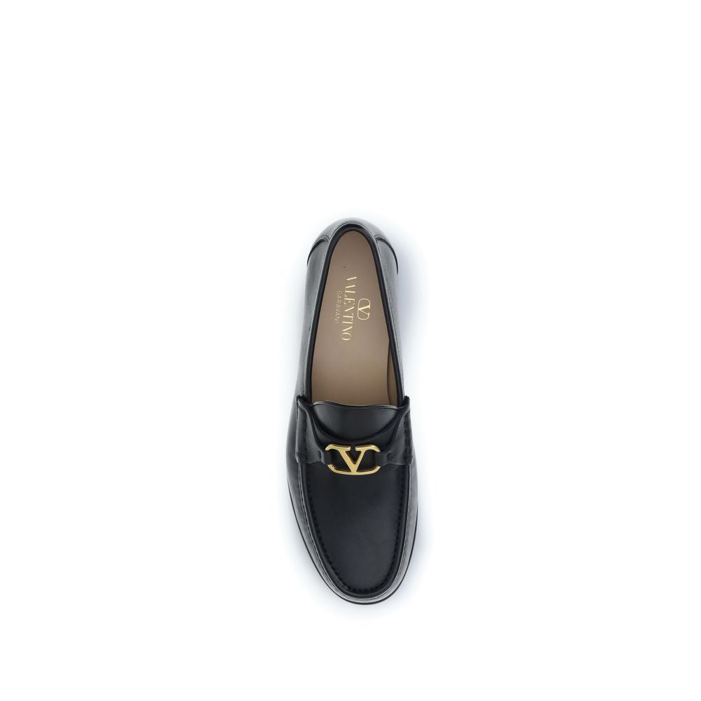 Valentino Garavani Black Calf Leather Bos Taurus Slip-On Loafers Curated Luxury Accessories by Orvyn