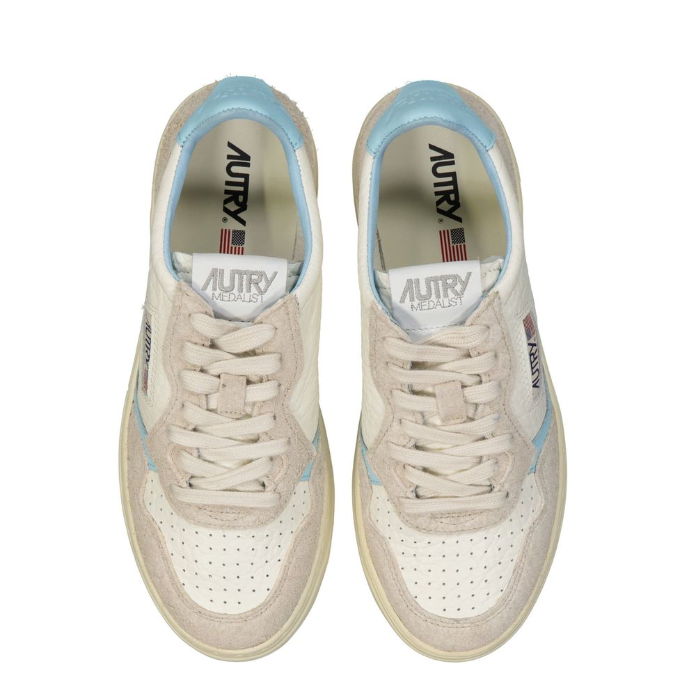 Autry White Leather Sneakers Curated Luxury Accessories by Orvyn