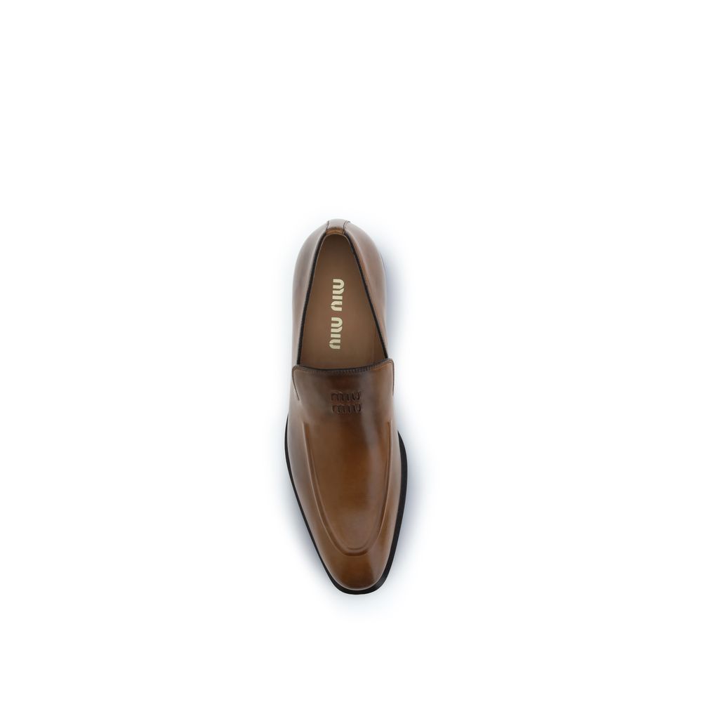 Miu Miu Brown Calf Leather Bos Taurus Slip-On Loafers Curated Luxury Accessories by Orvyn