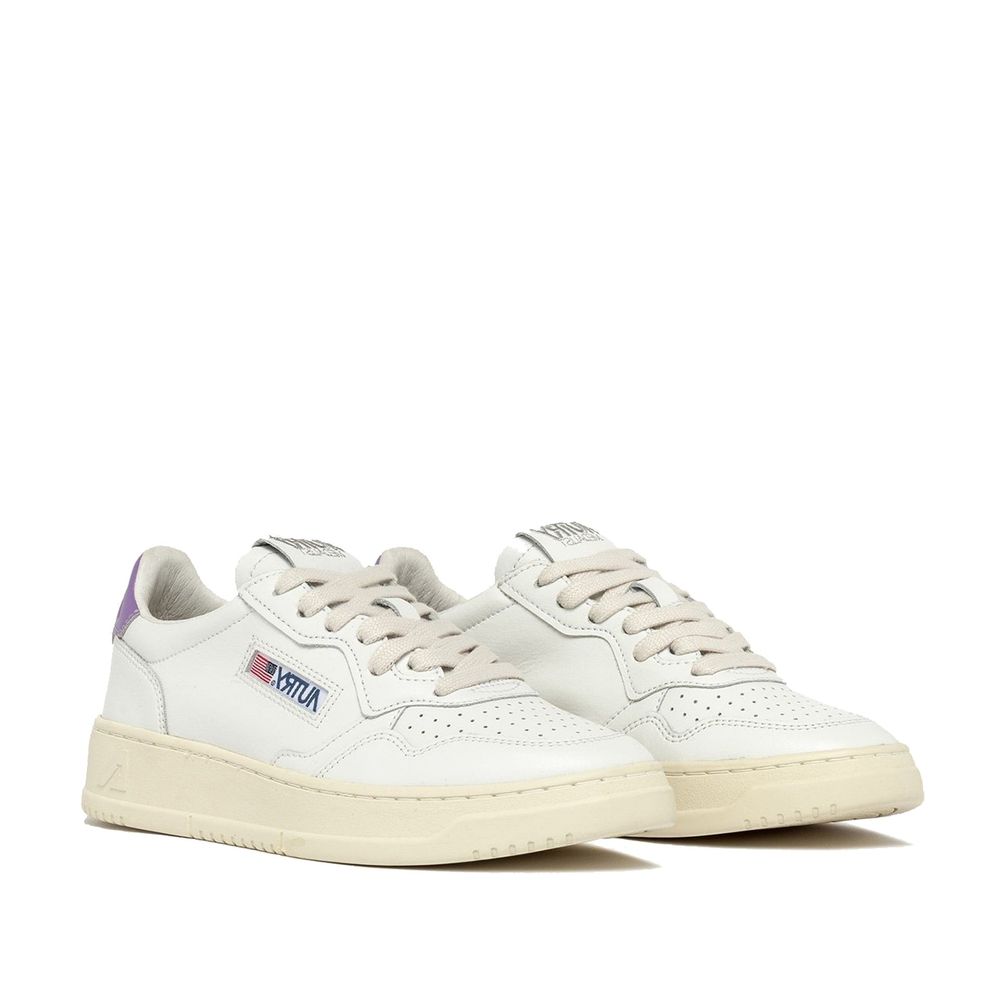 Autry White Leather Low Top Sneakers Curated Luxury Accessories by Orvyn