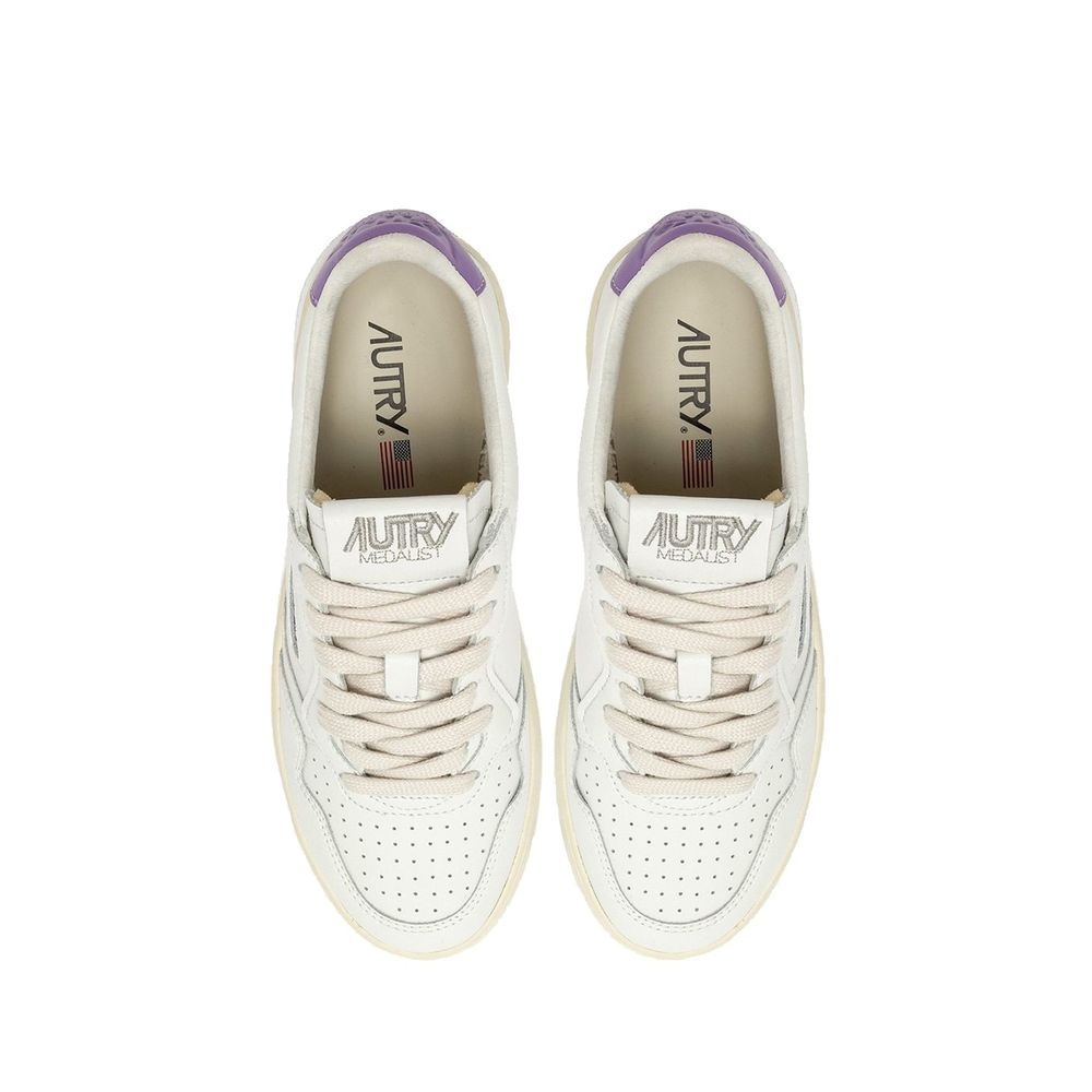 Autry White Leather Low Top Sneakers Curated Luxury Accessories by Orvyn