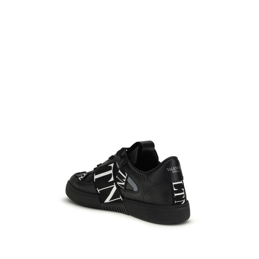 Valentino Garavani Black Calf Leather Bos Taurus Low Top Sneakers Curated Luxury Accessories by Orvyn