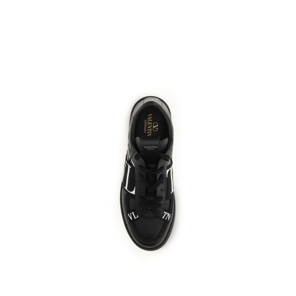 Valentino Garavani Black Calf Leather Bos Taurus Low Top Sneakers Curated Luxury Accessories by Orvyn