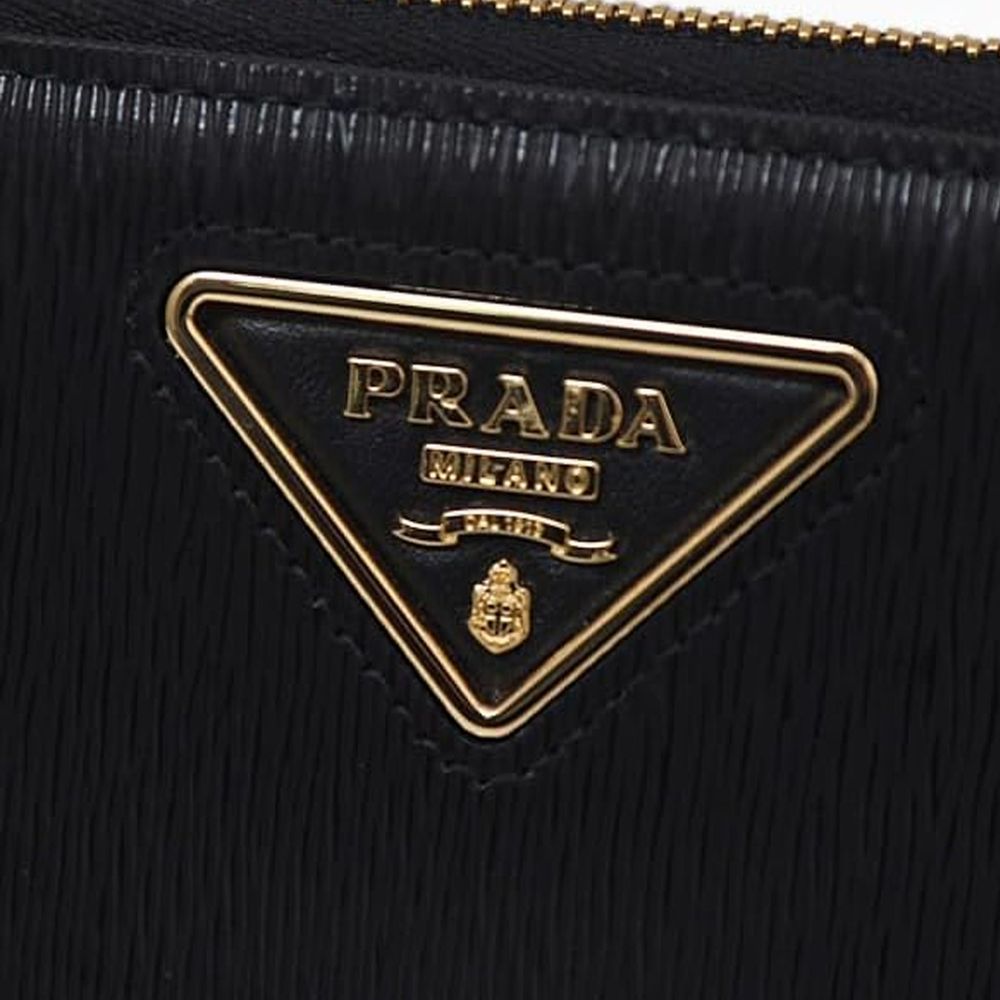Prada Black Calfskin Wallet Curated Luxury Accessories by Orvyn