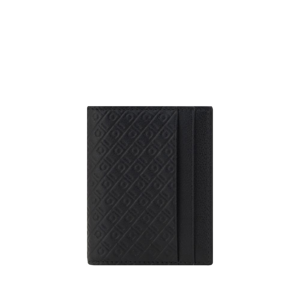 Ferragamo Black Calf Leather Bos Taurus Wallet Curated Luxury Accessories by Orvyn