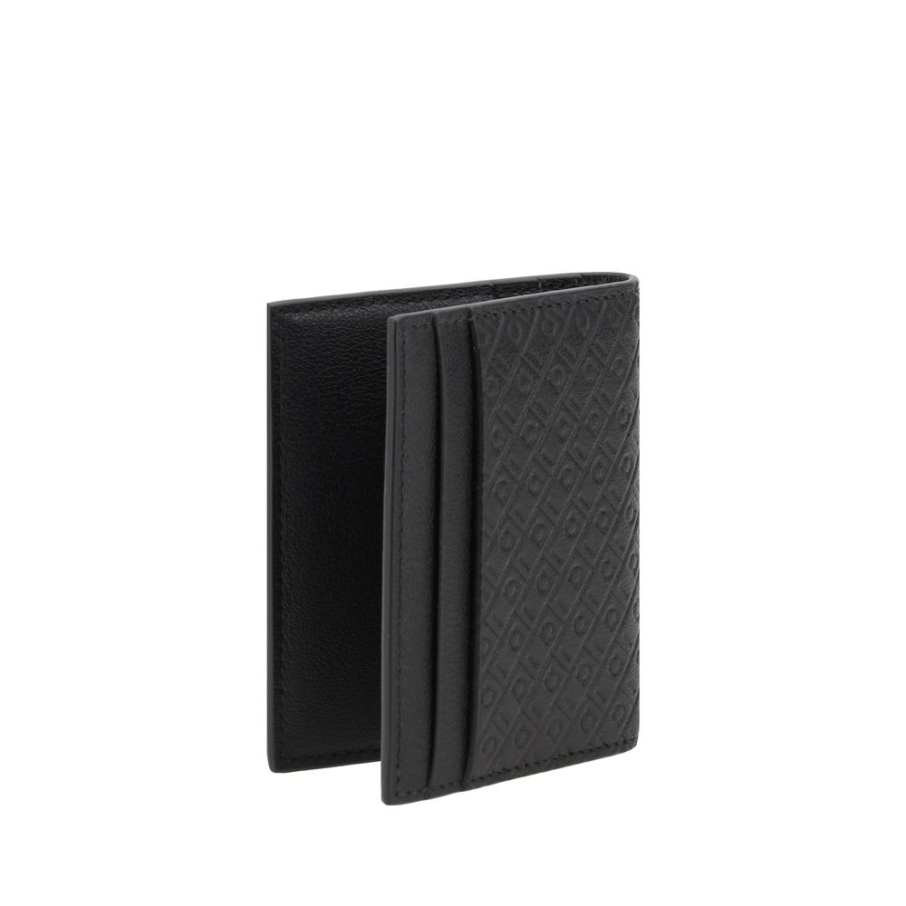 Ferragamo Black Calf Leather Bos Taurus Wallet Curated Luxury Accessories by Orvyn