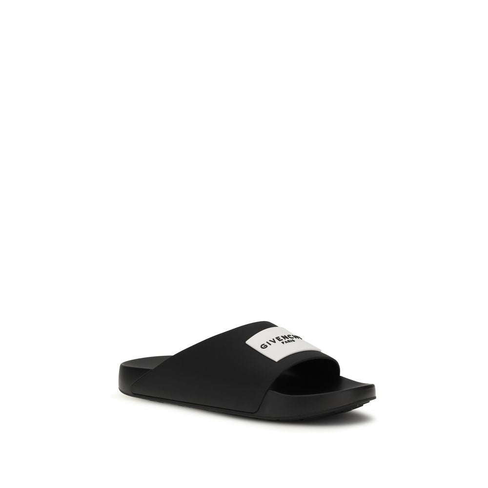 Givenchy Black Rubber Slippers Curated Luxury Accessories by Orvyn
