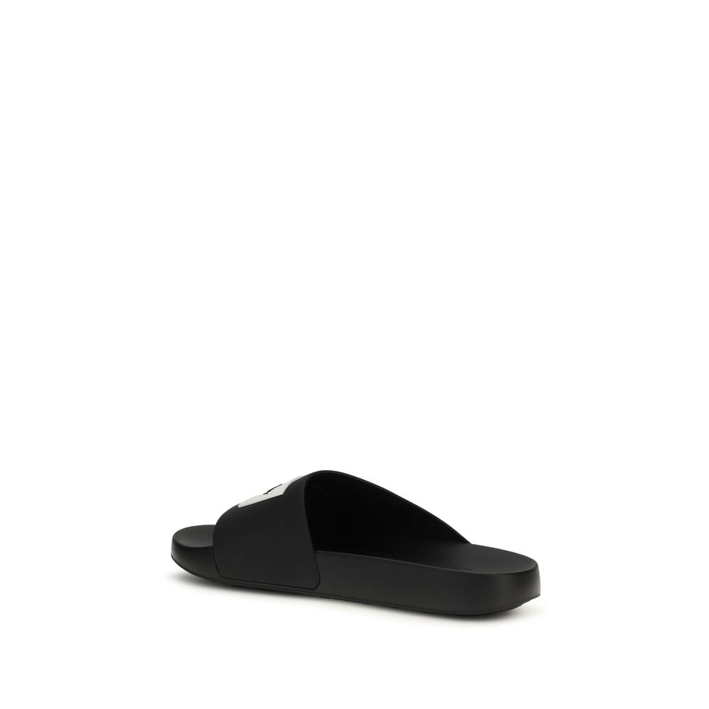Givenchy Black Rubber Slippers Curated Luxury Accessories by Orvyn