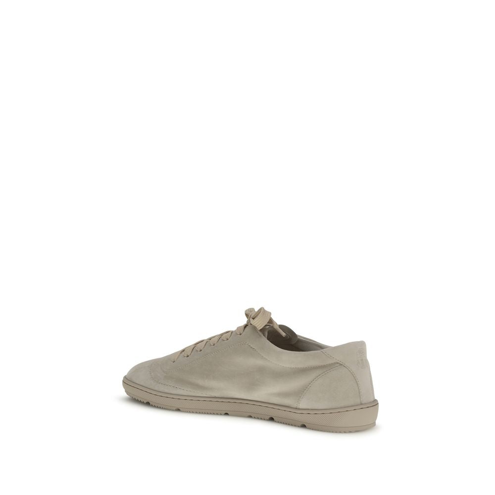 Brunello Cucinelli Beige Calf Leather Bos Taurus Low Top Sneakers Curated Luxury Accessories by Orvyn