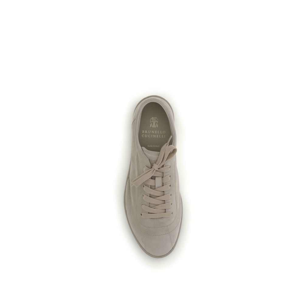 Brunello Cucinelli Beige Calf Leather Bos Taurus Low Top Sneakers Curated Luxury Accessories by Orvyn