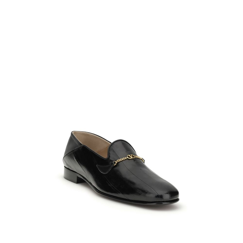 Valentino Garavani Black Calf Leather Bos Taurus Slip-On Loafers Curated Luxury Accessories by Orvyn