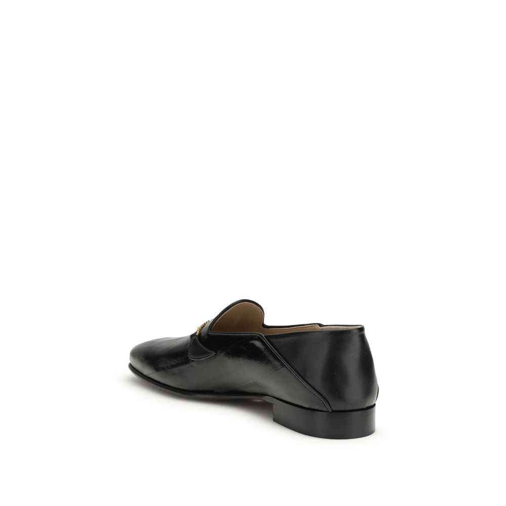 Valentino Garavani Black Calf Leather Bos Taurus Slip-On Loafers Curated Luxury Accessories by Orvyn