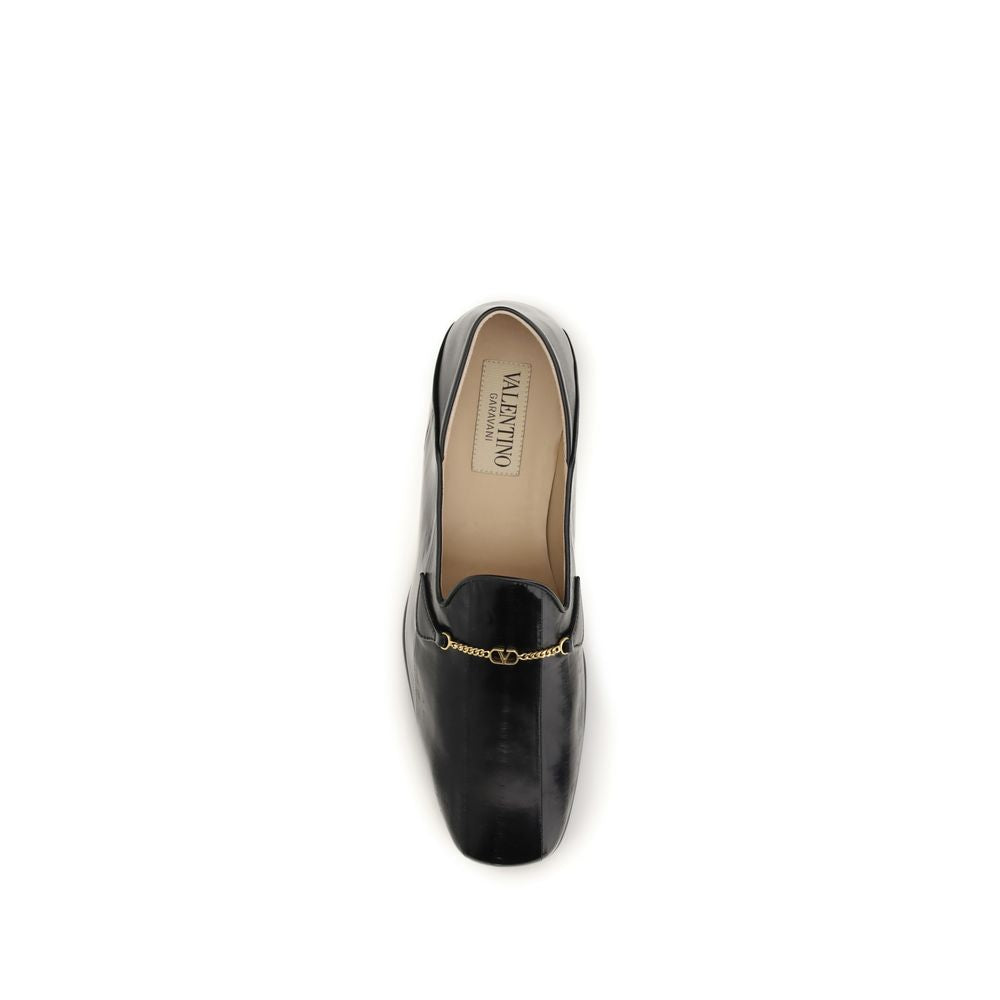 Valentino Garavani Black Calf Leather Bos Taurus Slip-On Loafers Curated Luxury Accessories by Orvyn