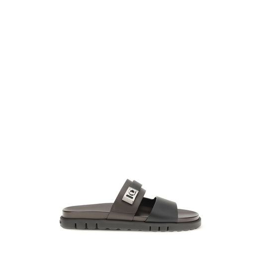 Ferragamo Black Calf Leather Bos Taurus Flat Sandals Curated Luxury Accessories by Orvyn