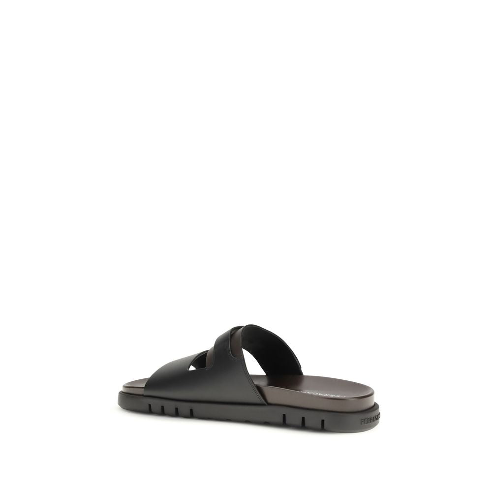 Ferragamo Black Calf Leather Bos Taurus Flat Sandals Curated Luxury Accessories by Orvyn
