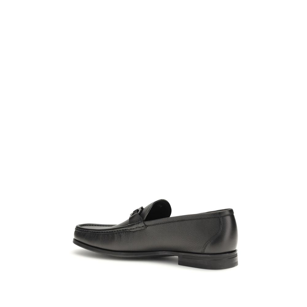 Ferragamo Black Calf Leather Bos Taurus Slip-On Loafers Curated Luxury Accessories by Orvyn