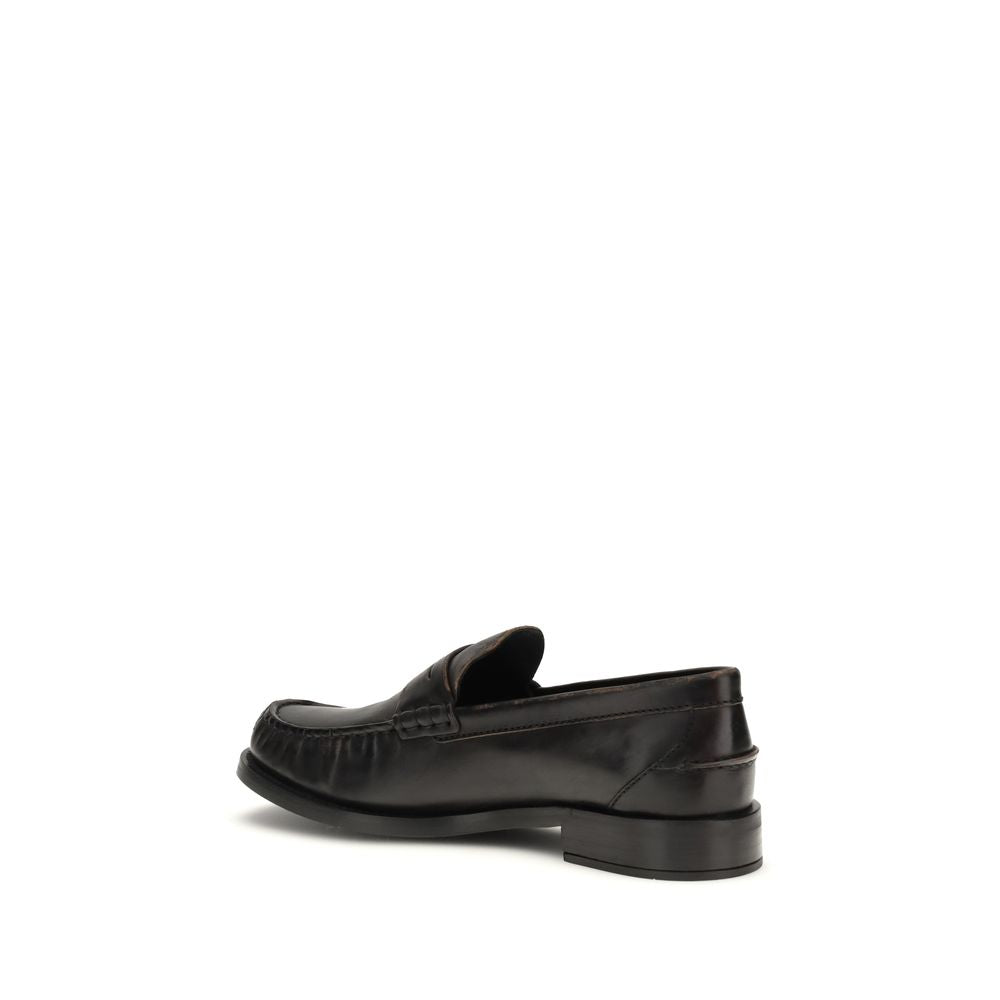Prada Black Calf Leather Bos Taurus Slip-On Loafers Curated Luxury Accessories by Orvyn