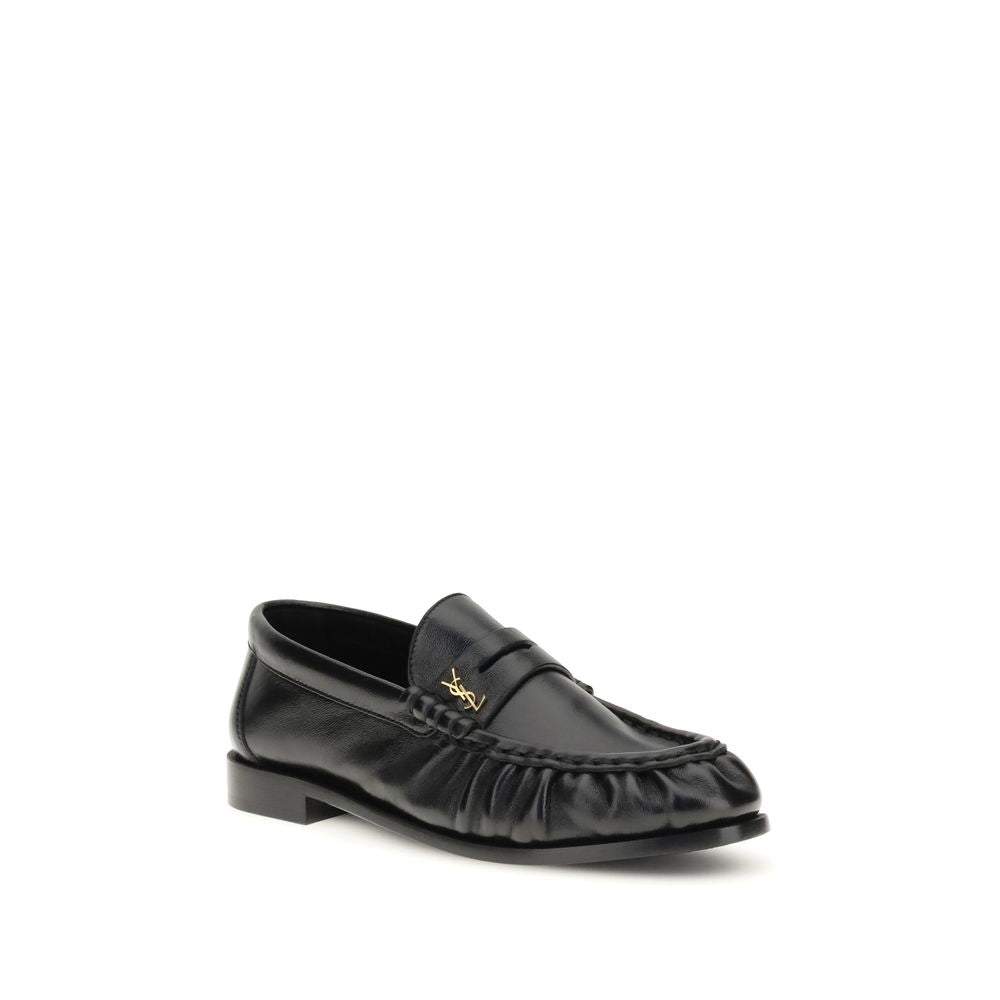 Saint Laurent Black Lamb Ovis Aries Aries Slip-On Loafers Curated Luxury Accessories by Orvyn