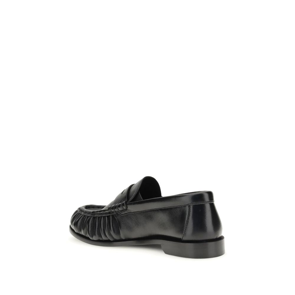Saint Laurent Black Lamb Ovis Aries Aries Slip-On Loafers Curated Luxury Accessories by Orvyn